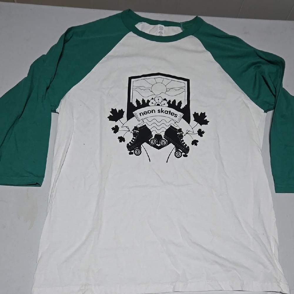 Green and White Shirt With Roller Skate Scene
